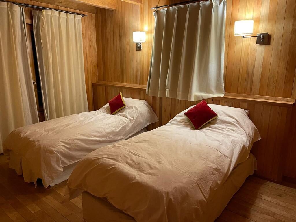 Habitación 2 con dos camas individuales — con cama carro debajo, opción de 3 huéspedes